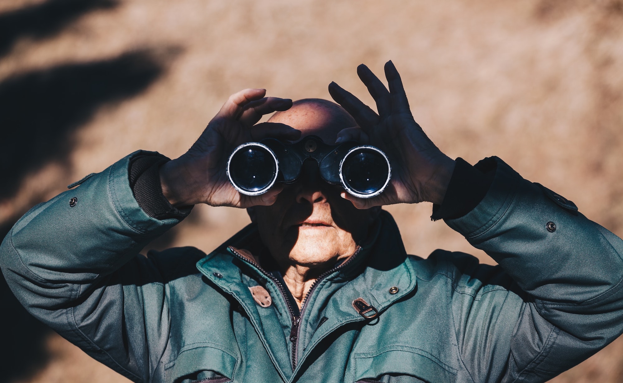 a man with binoculars