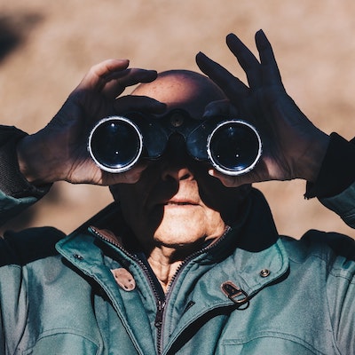 a man with binoculars