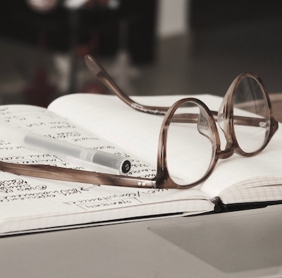 glasses on a notebook