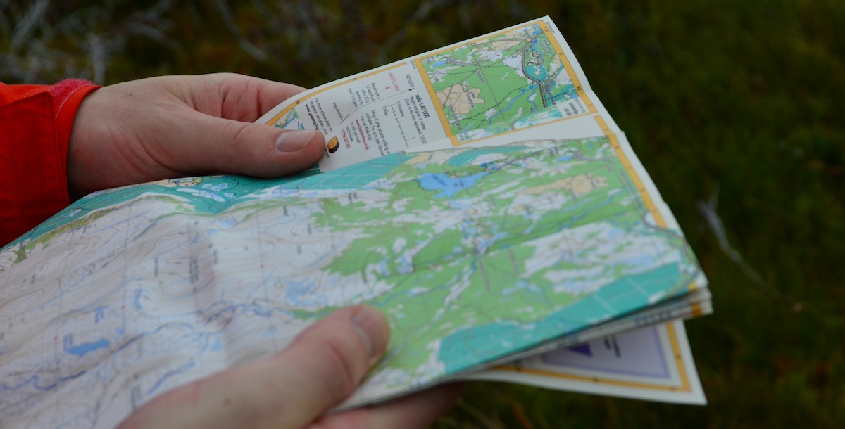 a hiker with a map